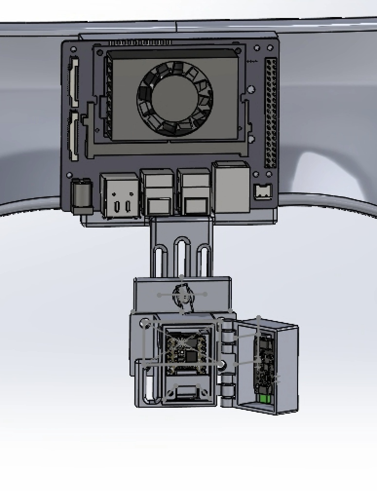 CAD close-up of the adjustable pelvis IMU positioning mechanism below the back-plate computer