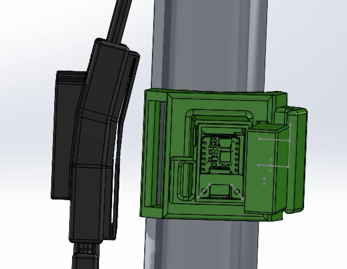 CAD close-up of the adjustable IMU package integrated with the shin cuff and shank structure